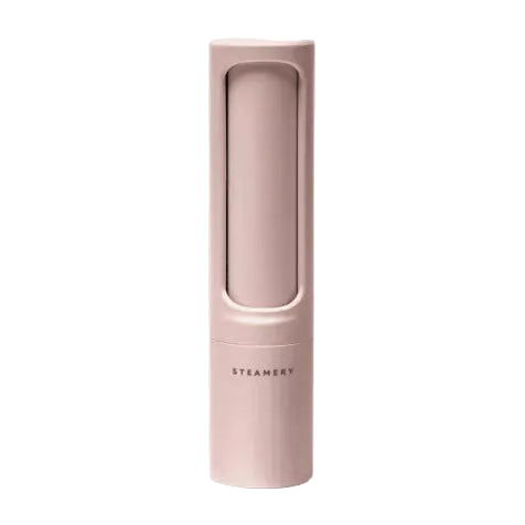 Pink handheld int remover with 'Steamery' branding on a white background