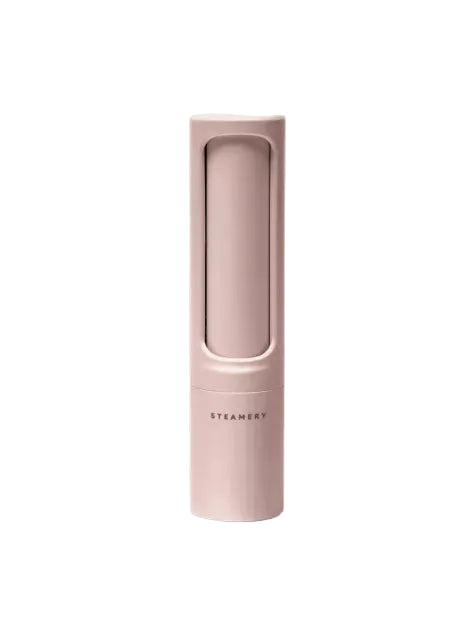 Pink handheld int remover with 'Steamery' branding on a white background